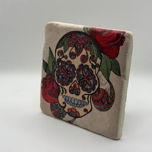 Sugar skull artwork printed on square travertine stone coaster
