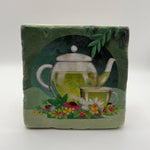 Tea pot green artwork printed on square travertine stone coaster