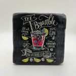 The Bramble artwork printed on square travertine stone coaster