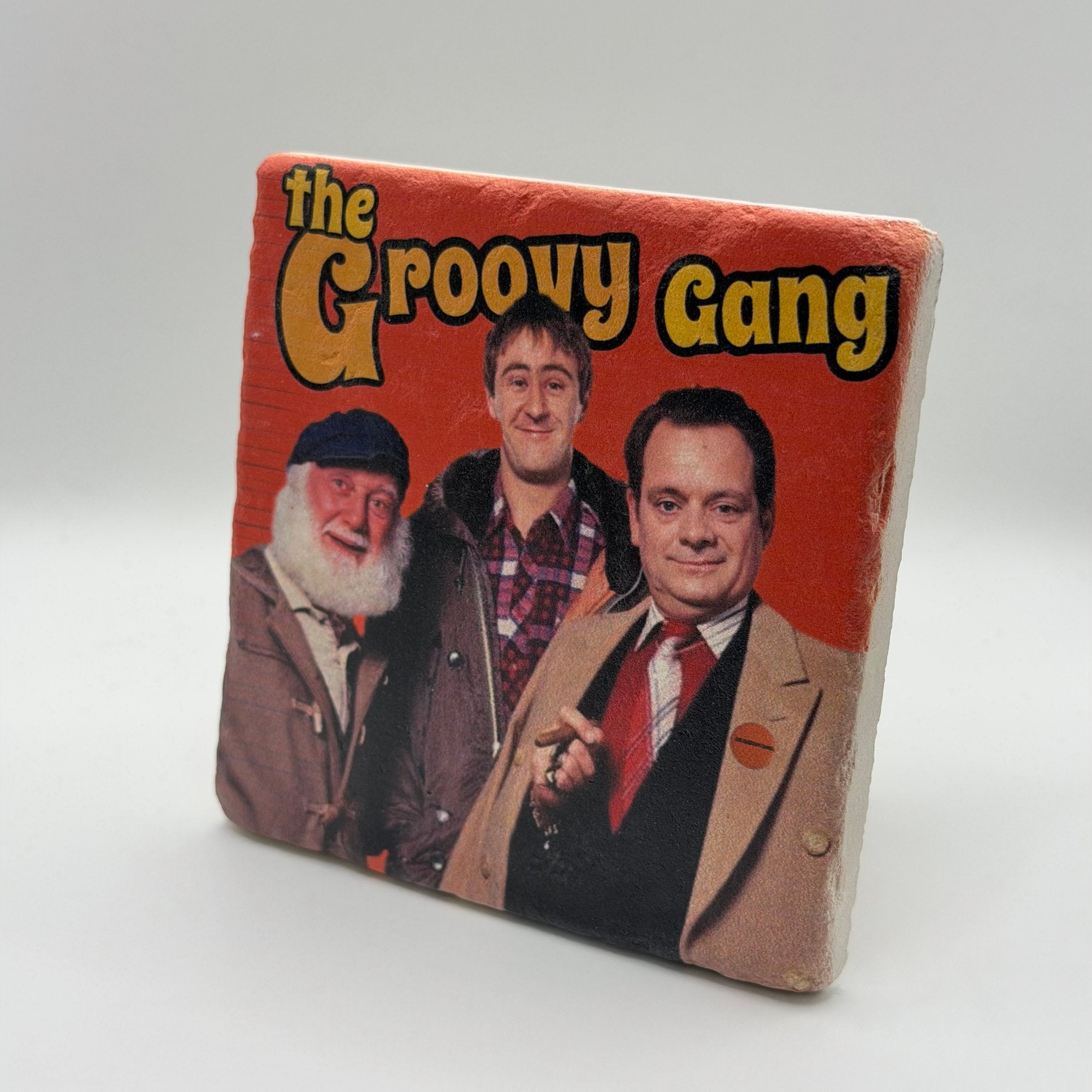 The Groovy Gang artwork printed on square travertine stone coaster