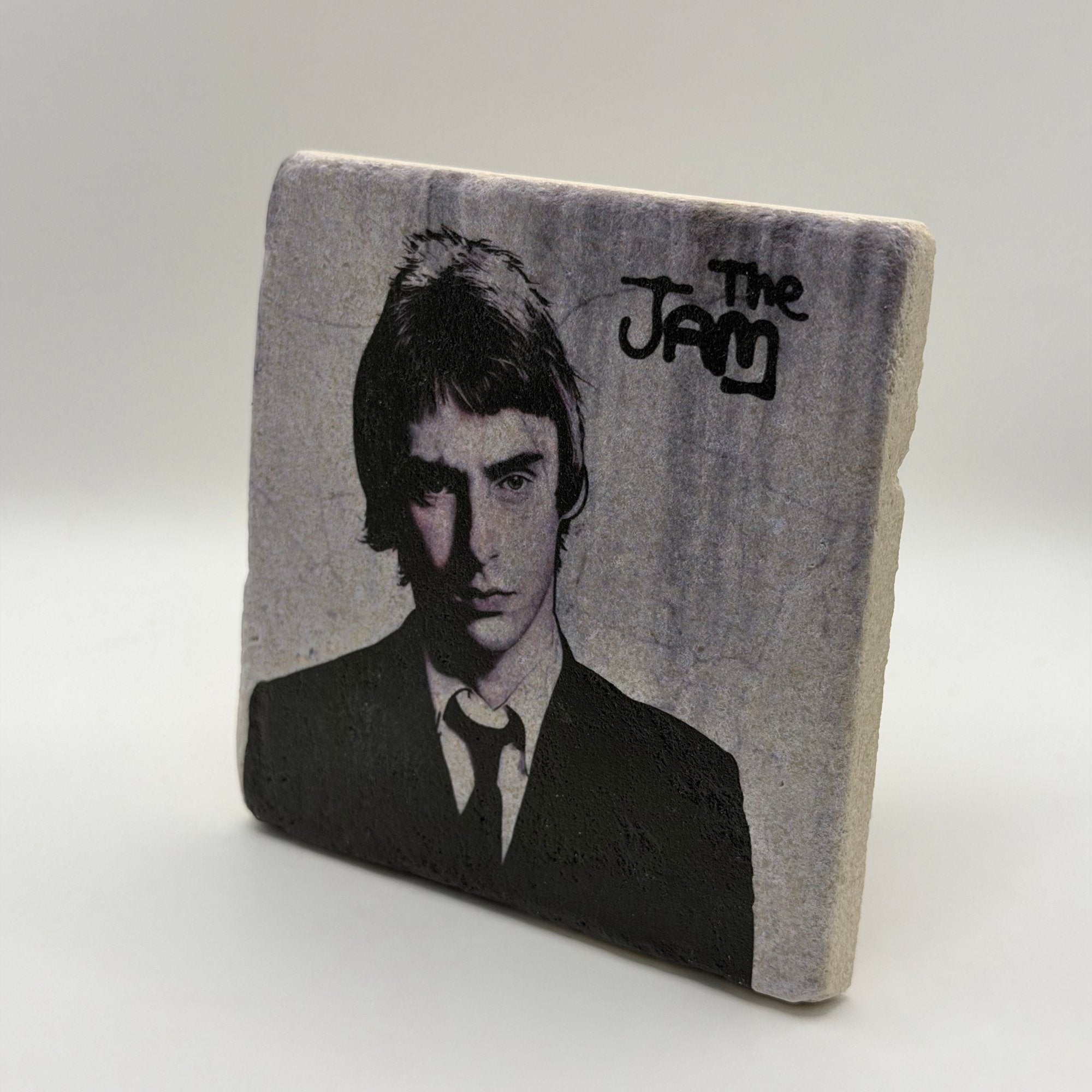 The Jam artwork printed on square travertine stone coaster