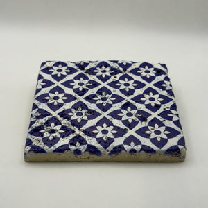 Colorful Tibetan flower design printed on square travertine stone coaster