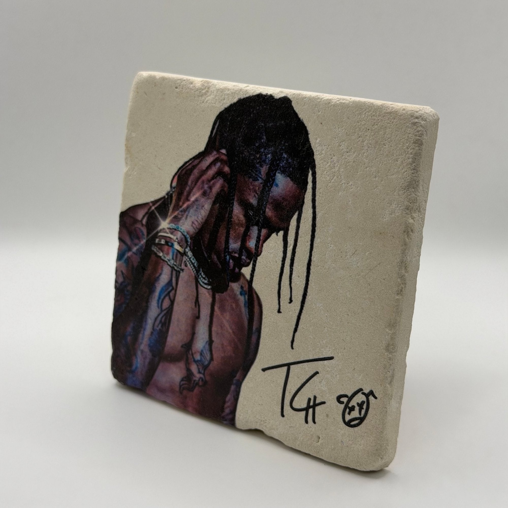 Travis Scott artwork printed on square travertine stone coaster