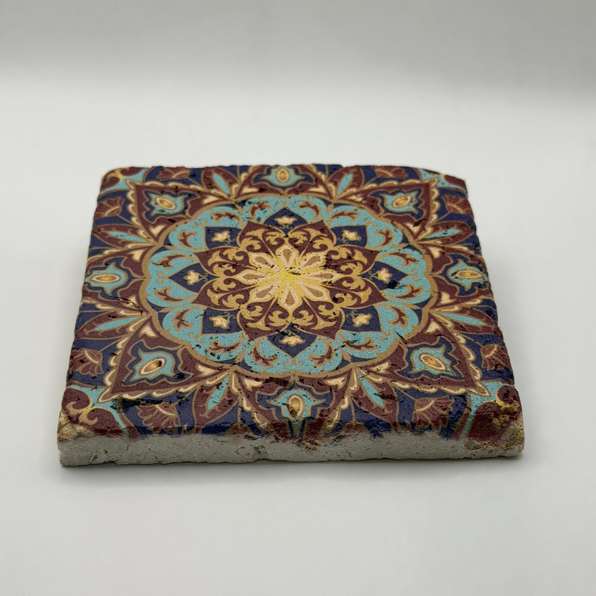Tribal pattern artwork printed on square natural travertine stone coaster