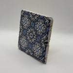 Tribal floral pattern printed on square natural travertine stone coaster
