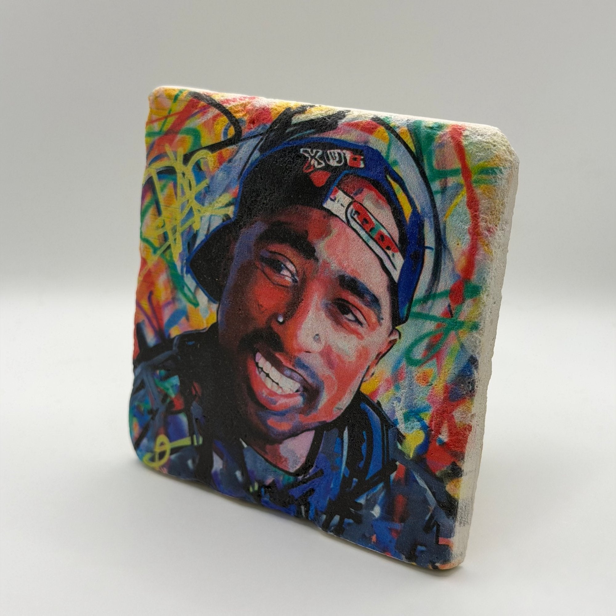 Tupac Shakur artwork printed on square travertine stone coaster