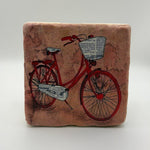 Vintage red bicycle artwork printed on square travertine stone coaster