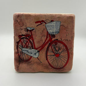 Vintage red bicycle artwork printed on square travertine stone coaster