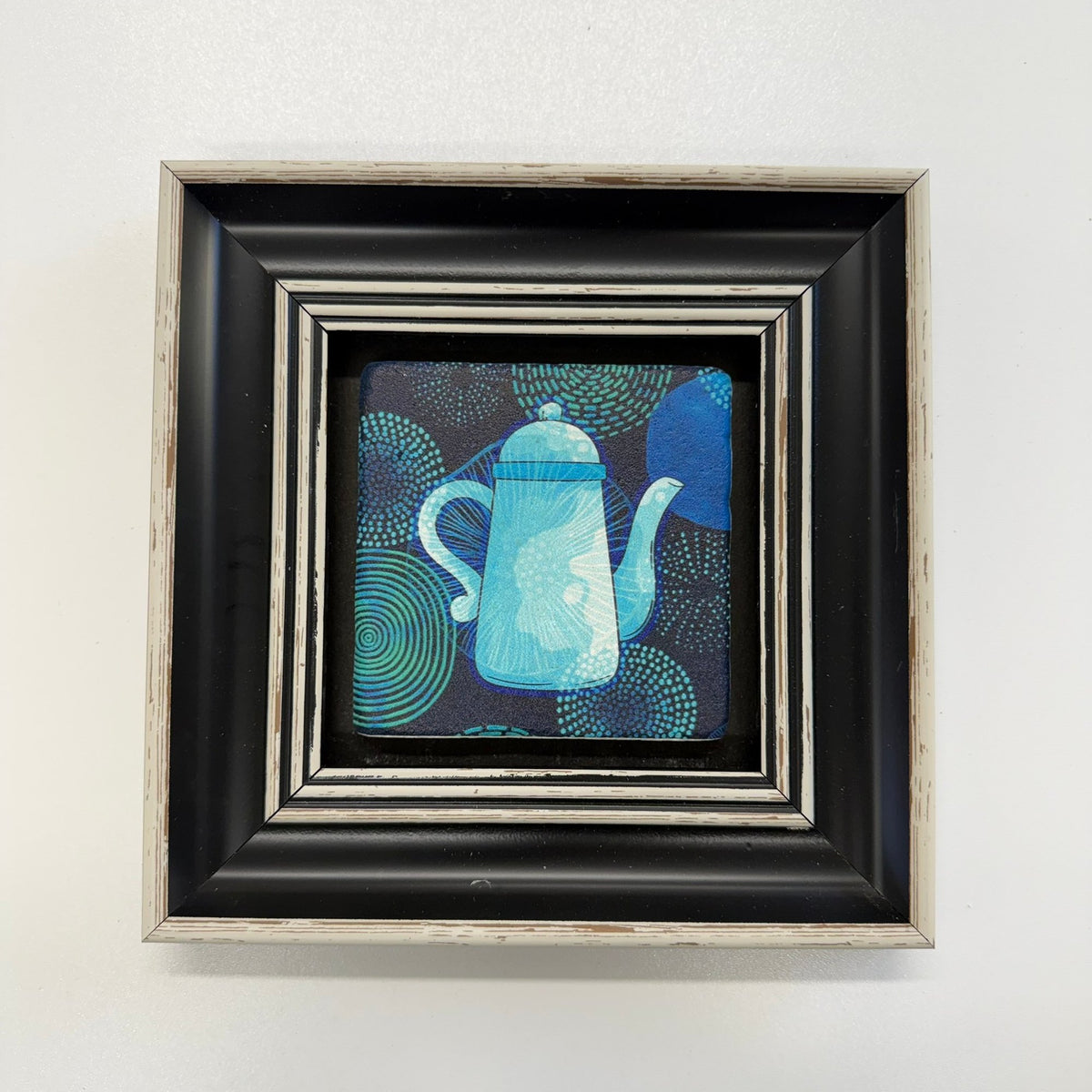 Variant Mapping v4 | vintage-tea-pot-blue-natural-stone-coaster | with Black Frame | sha256:49e2d8f7d134