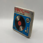 Vinyl record artwork printed on square travertine stone coaster