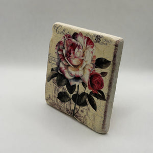 Vintage illustration of white roses printed on square travertine stone coaster