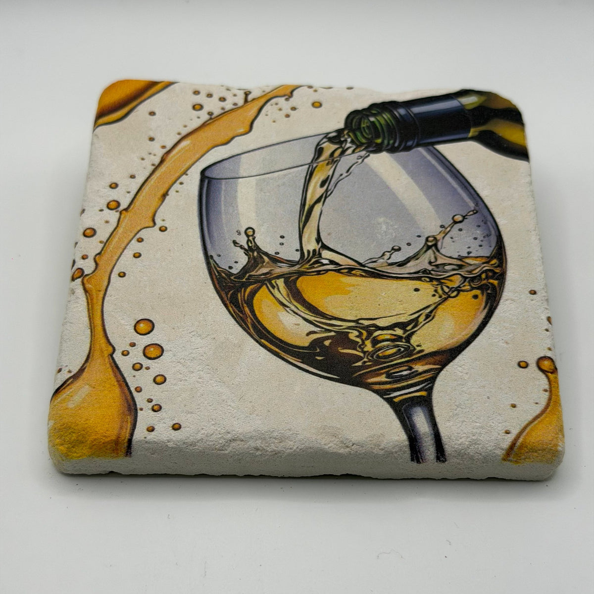 White wine-inspired design printed on square travertine stone coaster