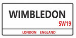 Wimbledon London tennis ball design displayed as a decorative wall sign