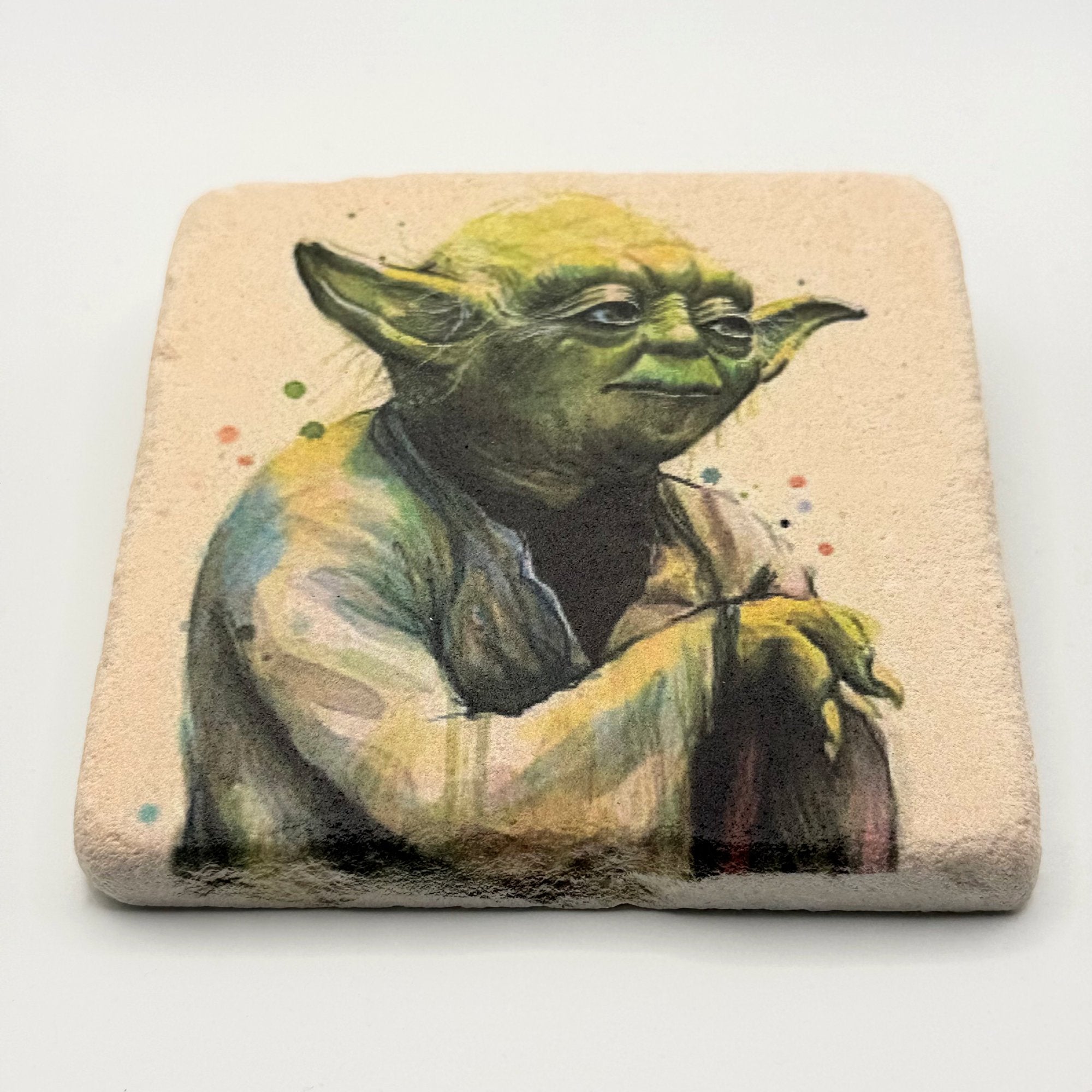Yoda character artwork printed on square travertine stone coaster