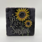 You are my sunshine quote printed on square travertine stone coaster